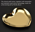 Nordic heart-shaped stainless steel jewelry tray with engraved design, used for displaying necklaces and rings or as home decor.
