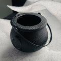 Two plastic Halloween cauldrons for kids, blow mold candy holders, perfect for Halloween party favors and pretend play.