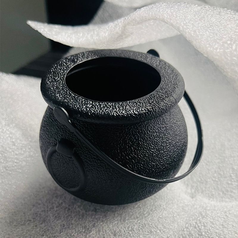 Two plastic Halloween cauldrons for kids, blow mold candy holders, perfect for Halloween party favors and pretend play.