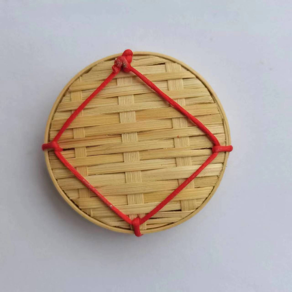 Two woven bamboo food storage trays with curved edges, ideal for snacks, cupcakes, or fruit presentation.