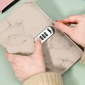 Three marble-patterned locked diaries for kids with 100 pages, waterproof cover, ideal for secure journaling by Everything Baby.