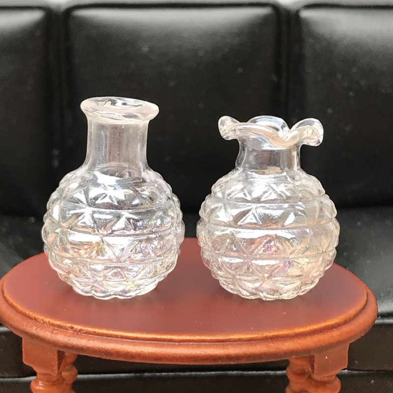Set of four miniature dollhouse vases from Everything Baby, perfect as mini house ornaments and toy collectibles.