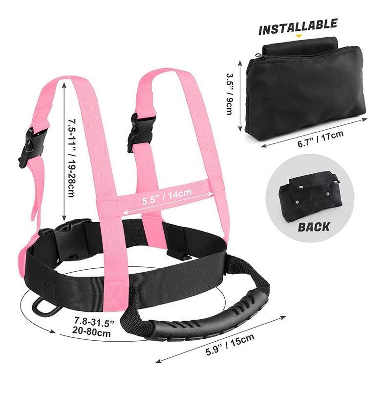 Pink children's ski protection belt and harness by Everything Baby, used for skiing safety and training.