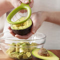 Stainless steel avocado cube maker and fruit cutter with slicer and peeler, designed for easy avocado and kiwi preparation in the kitchen.