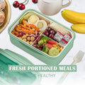 Durable adult and kids bento lunch box with spoon and fork, BPA-free, perfect size for on-the-go meals, from Everything Baby.