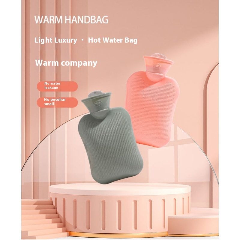 Three colorful Rubber Hot Water Bottles, 500ml, for pain relief and hot or cold therapy, suitable for adults and kids.