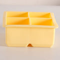 Two BPA-free silicone large ice cube trays with removable lids, stackable and easy to release, suitable for baby feeding and drinks.