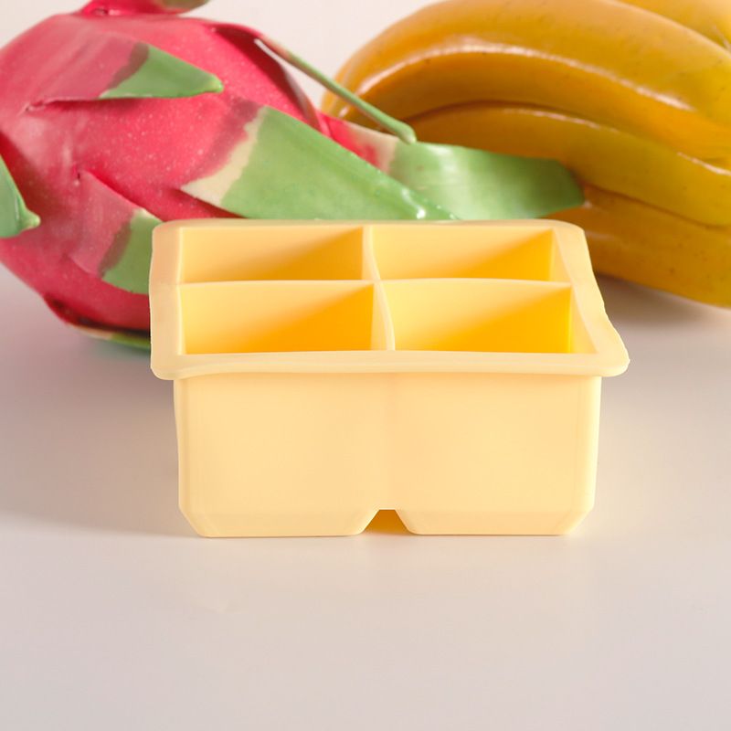 Two large BPA-free silicone ice cube trays with removable lids, stackable and easy to release, for baby feeding and nursing.