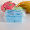 Two BPA-free silicone large ice cube trays with removable lids, stackable and easy to release, for baby feeding and beverages.