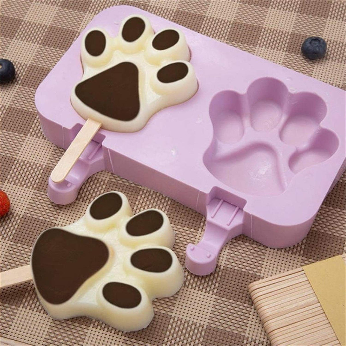 Silicone popsicle molds with 5 cavities and lids, ideal for homemade ice cream and kids' pretend play toy by Everything Baby.