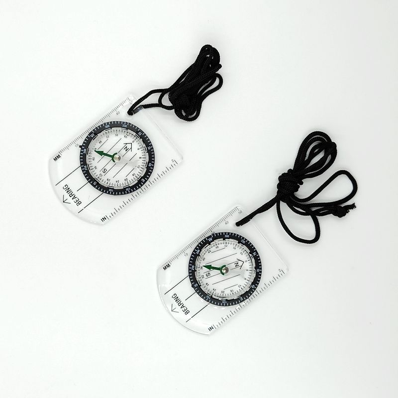 Two Boy Scout orienteering compasses for kids, featuring baseplate design, ideal for map reading and outdoor play activities.