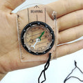 Two Boy Scout compasses for kids, outdoor survival and map reading, featuring baseplate design for children’s outdoor play.