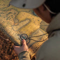 Two boy scout compasses for kids, baseplate design, used for map reading and outdoor navigation, suitable for children’s outdoor play.