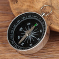 Kids' pocket compass by Everything Baby with key ring, outdoor navigation tool for camping, hiking, and outdoor play.