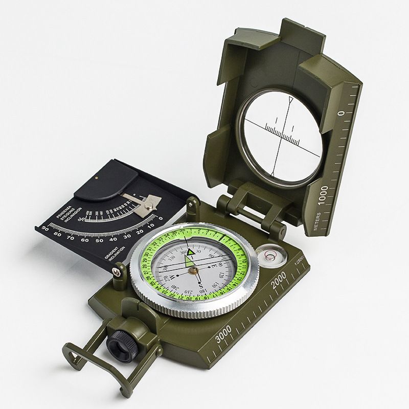 Impact-resistant waterproof military sighting compass with inclinometer, suitable for hiking and outdoor adventure activities.