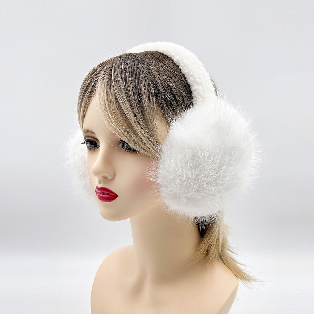 Girls' winter faux fur ear muffs by Everything Baby, adjustable fuzzy ear warmers for outdoor cold weather and winter outfits.