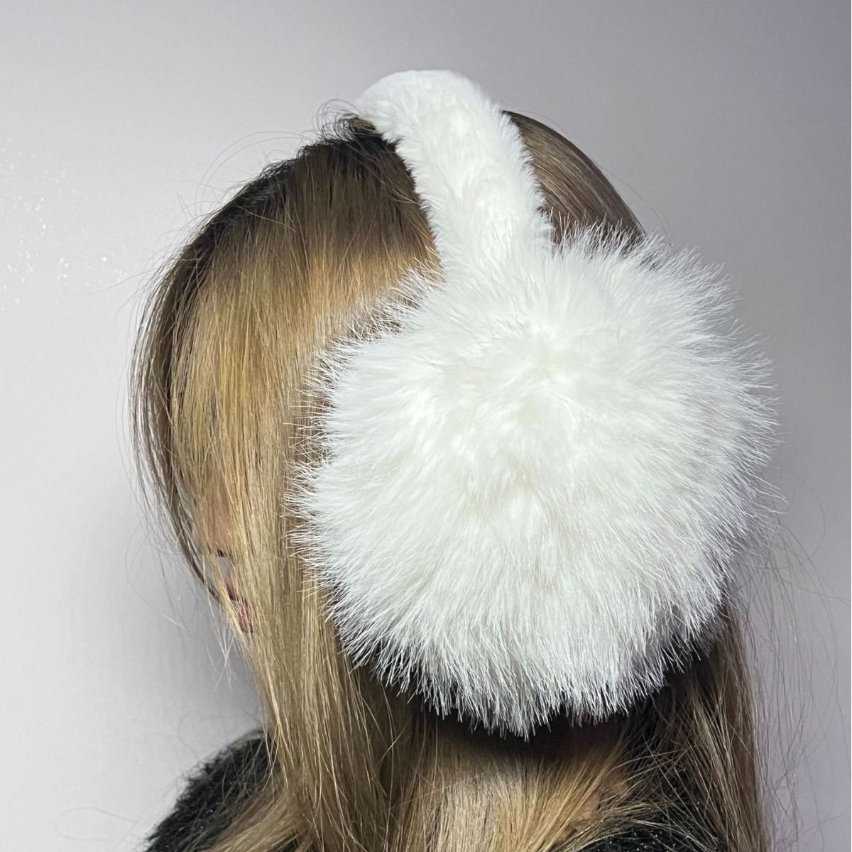 Girls winter faux fur ear muffs, adjustable fuzzy ear warmers for outdoor warmth and comfort in stylish winter headbands.