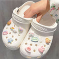 Set of 20 unisex shoe charms featuring resin cartoon flowers and pearls, designed for Crocs sandals and kids' footwear.