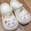 20 pcs unisex shoe charms for Crocs, resin cartoon flowers and pearl chains, perfect for girls and women’s sandals.