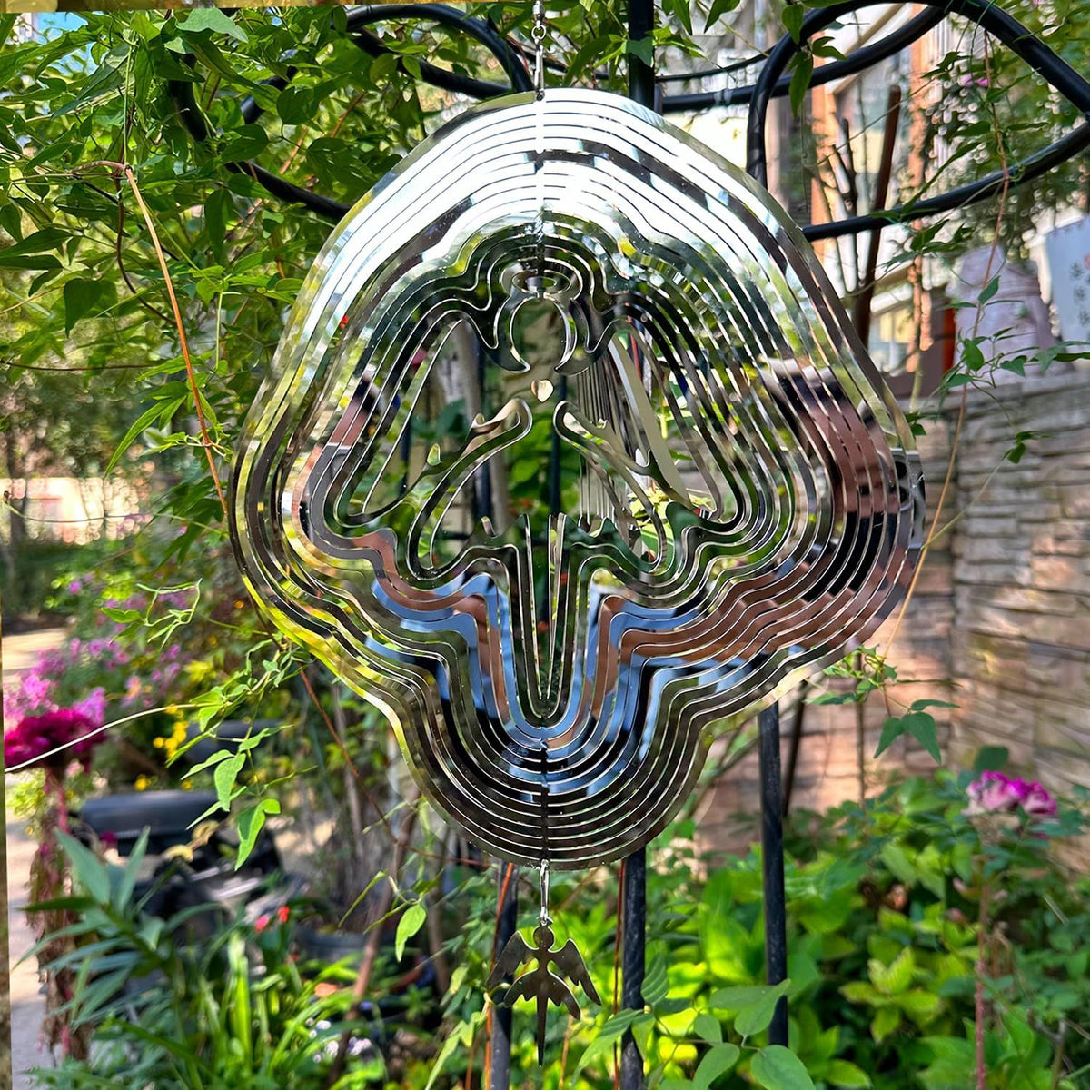 Large metal angel wind spinner for yard and garden, outdoor 3D hanging wind spinner with colorful angel figurine.