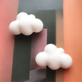 Three 3D cloud-shaped silicone molds for chocolate, mousse, and resin, ideal for baking, crafting, and pretend play with kids.