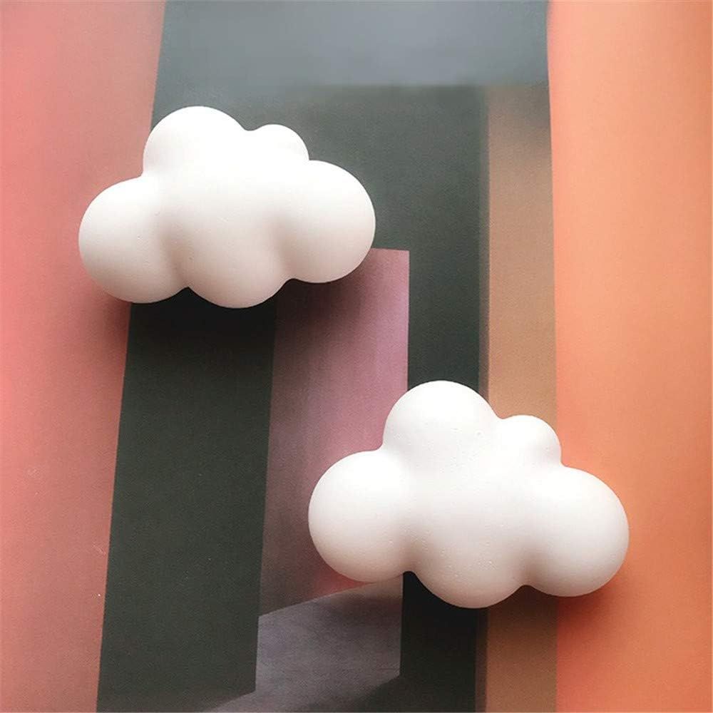 Three 3D cloud-shaped silicone molds for chocolate, mousse, and resin, ideal for baking, crafting, and pretend play with kids.