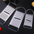 Two ergonomic metal food graters for cheese, garlic, lemon, and ginger, ideal for baby and kids feeding, by Everything Baby.