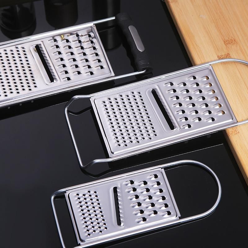 Two ergonomic metal cheese and garlic graters from Everything Baby, handheld citrus and vegetable grater, suitable for kitchen use.