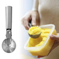 Two stainless steel ice cream scoops with trigger mechanism, suitable for fruit and ice cream serving, designed for heavy-duty use.