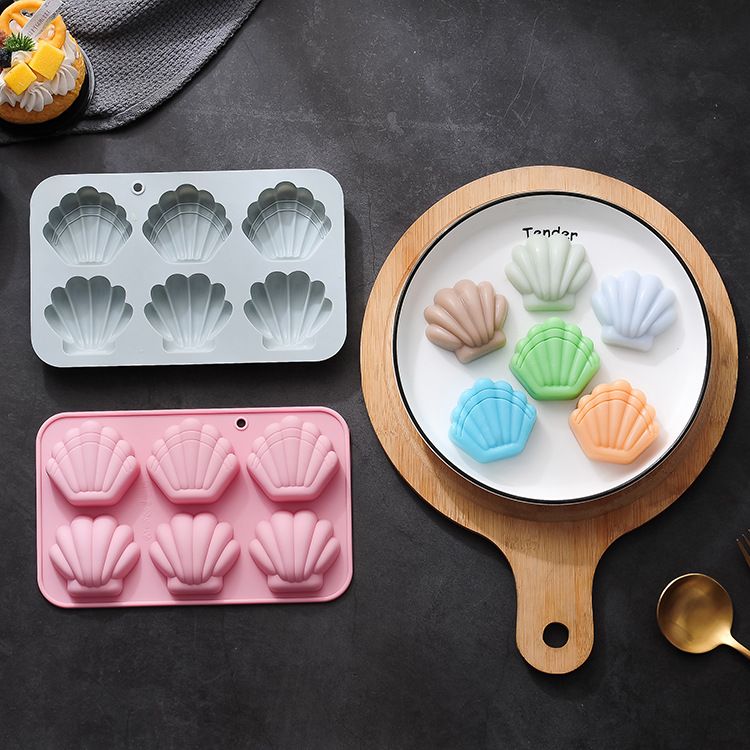 Silicone shell-shaped ice cube and chocolate mold with easy-release design, ideal for making soap, wax melts, and treats.