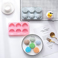 Two silicone shell-shaped ice cube trays for chocolates, soaps, and wax melts, featuring easy-release non-stick design.