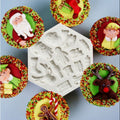 Two Christmas Santa Elk gift socks silicone molds for cake, fondant, cookies, and dessert decorations.