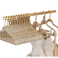 Set of 10 clear plastic hangers with gold glitter non-slip coating for boys' sleepwear, ideal for organizing children's clothing.