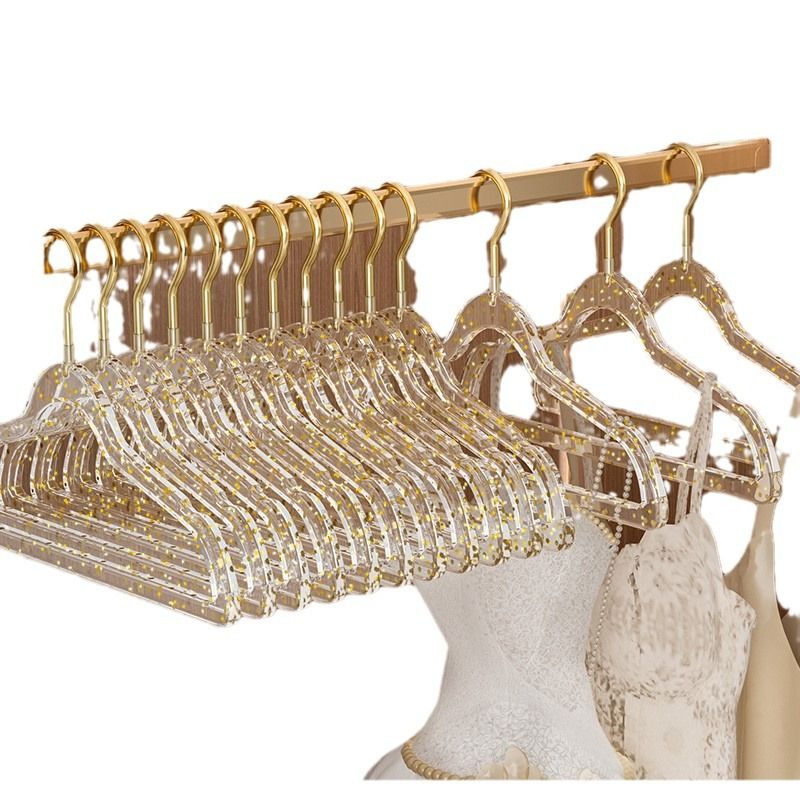 Set of 10 clear plastic hangers with gold glitter non-slip coating for boys' sleepwear, ideal for organizing children's clothing.