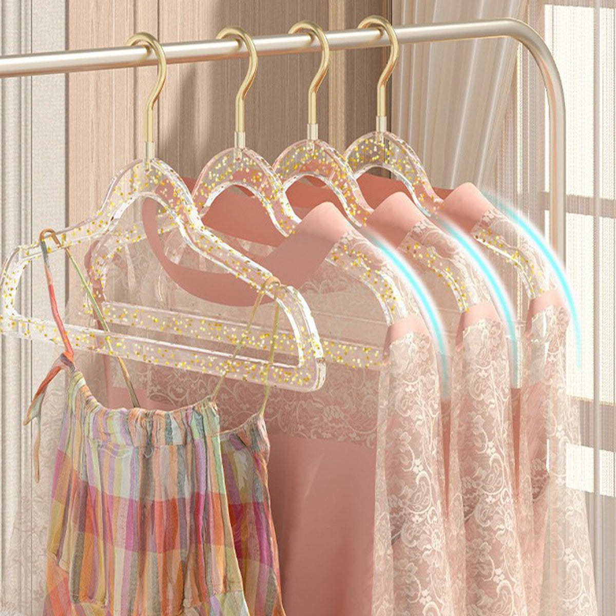 Set of 10 clear plastic hangers with gold glitter non-slip coating for baby boys' sleepwear, ideal for organizing children's clothing.