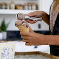 Two portable stainless steel ice cream scoops with trigger handles, ideal for serving ice cream and perfect for baby and kids feeding.