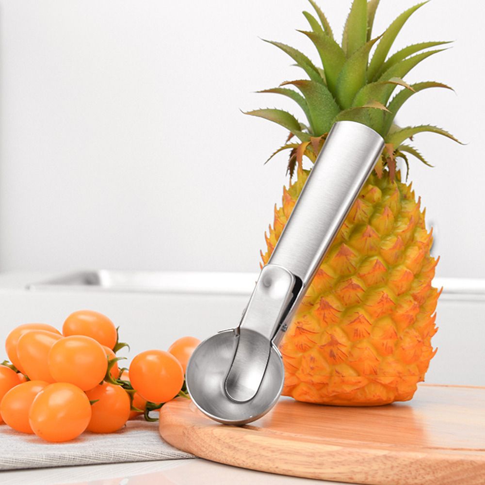 Two portable stainless steel ice cream scoops with trigger and comfortable handle, ideal for serving ice cream and kids' treats.