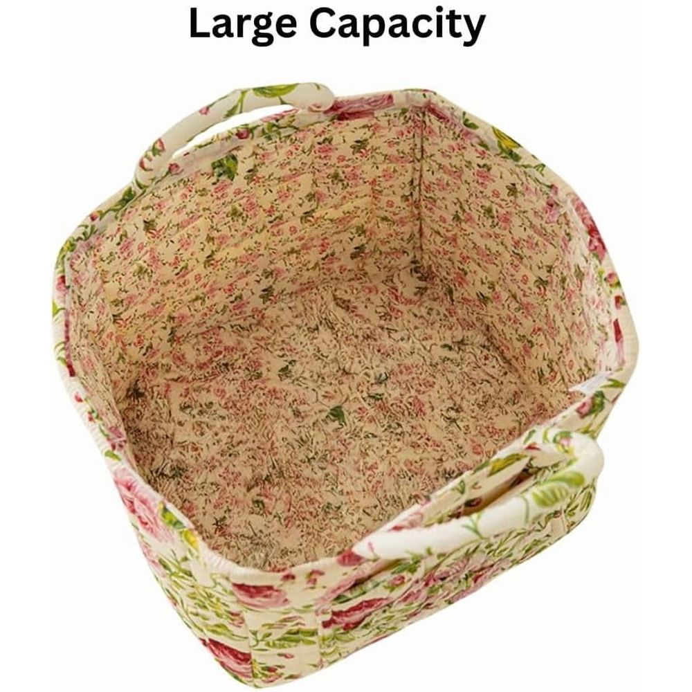 Cotton quilted floral foldable storage basket with handles for baby and kids toy organization and home laundry storage.