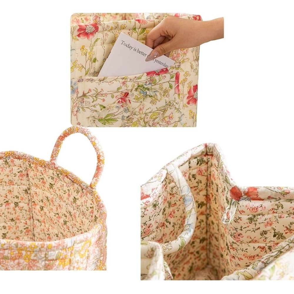 Cotton quilted floral foldable storage basket with handles, used as a portable toy or laundry organizer for kids' room storage.