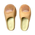 Baby girl wearing Big Toe Slides by Everything Baby, stylish outdoor Halloween party footwear with fancy dress design.