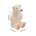 Beige silicone suction cup toothbrush holder for baby and kids, designed for bathroom use, from Everything Baby.
