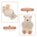 Beige silicone suction cup toothbrush holder for baby and kids bathroom use, from Everything Baby, with a secure suction cup design.