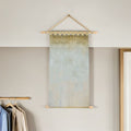 Eight beige wooden banner rods for wall hangings, tapestries, DIY crafts, and macrame projects by Everything Baby.