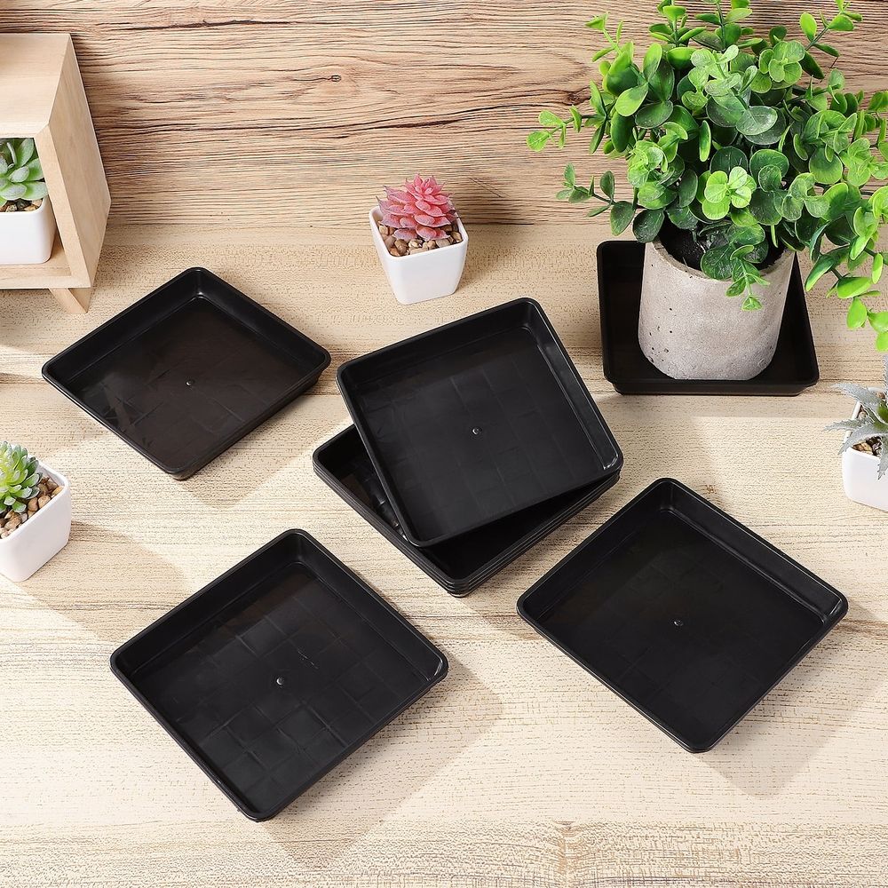 Black plastic square flower pot tray from Everything Baby, suitable for indoor and outdoor planters and pretend play toy setups.