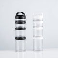 Stackable transparent black snack containers for kids and adults, featuring four cups for school and travel use.