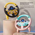 Cute children's steering wheel toy with lights, driving sounds, and educational features for babies and kids, from Everything Baby.