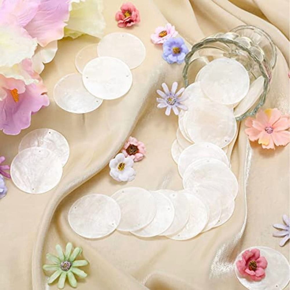 300-piece set of 2-inch round white Capiz shells with holes, ideal for wind chimes and jewelry making by Everything Baby.