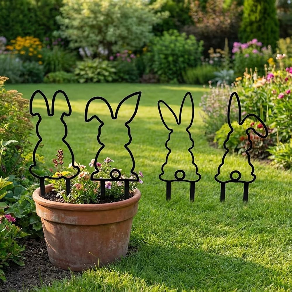 Set of four black metal rabbit garden stakes for outdoor yard decor, perfect for spring festivals and outdoor play spaces.
