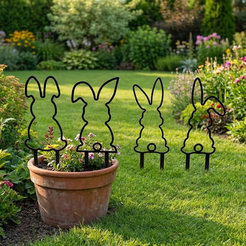 Set of four black metal rabbit garden stakes for outdoor yard decor, perfect for spring festivals and outdoor play spaces.