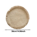 Round jute placemat with tassel fringe, natural linen material, heat-resistant, ideal for dining tables, easy to clean with damp cloth.